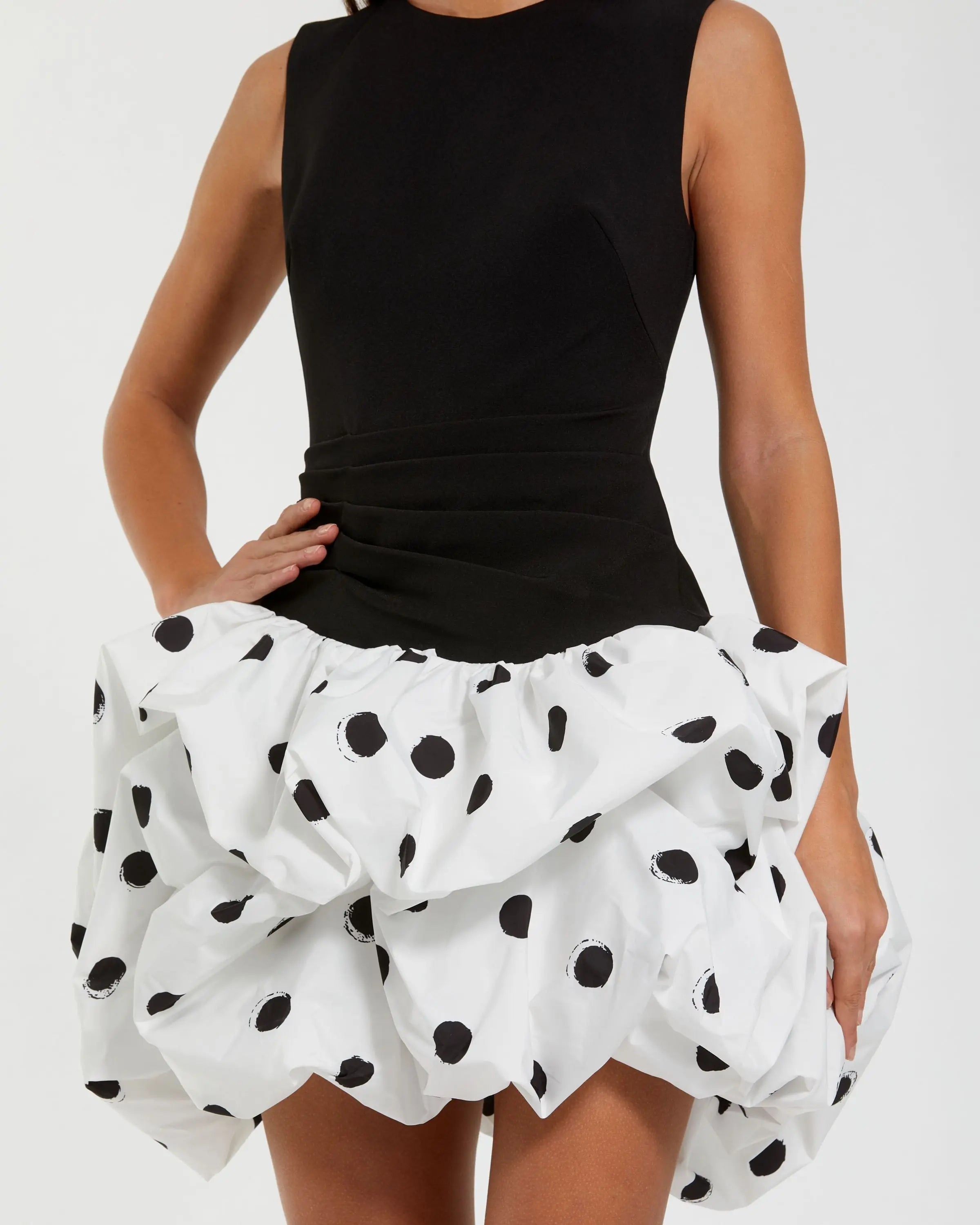 Black and White Sleeveless Crepe Mini Dress with Polka Dot Skirt